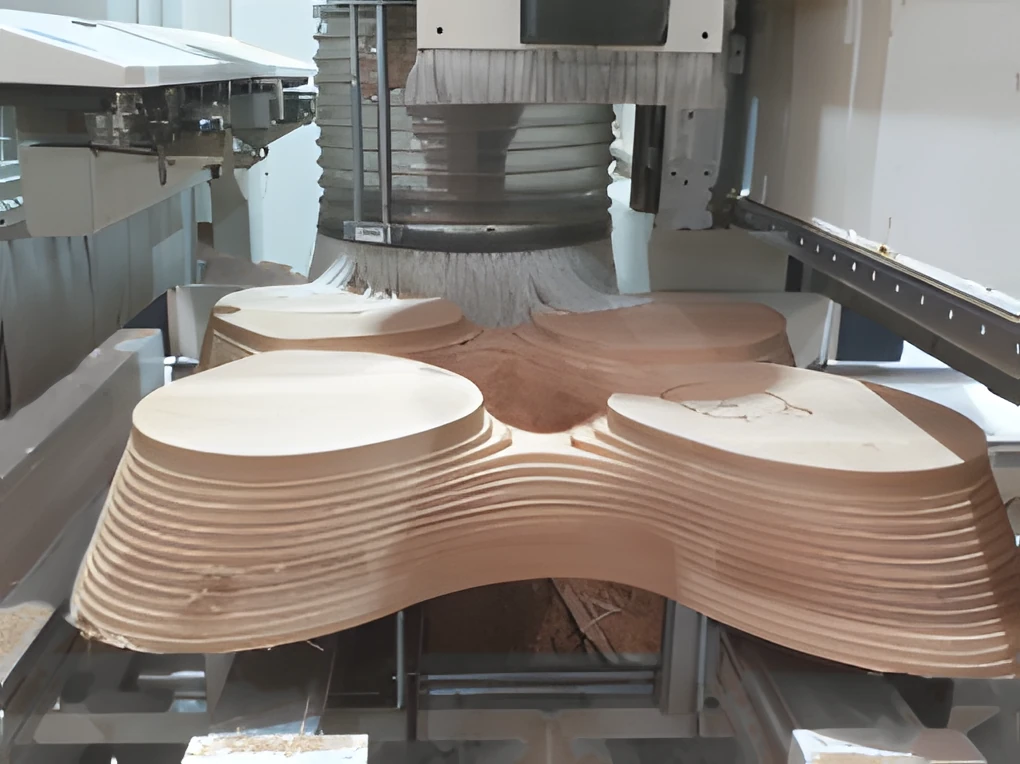 Organic solid oak table being machined layer by layer on the 5-axis CNC