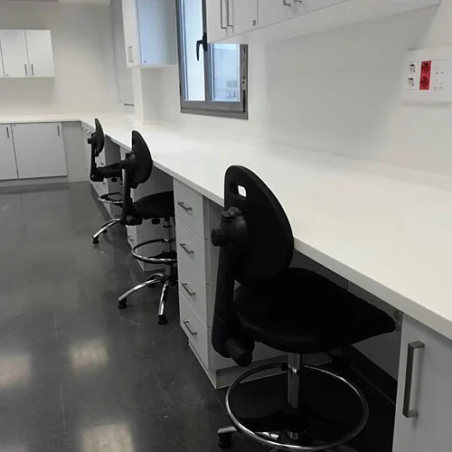 Continuous workstations with solid surface worktop and drawer units